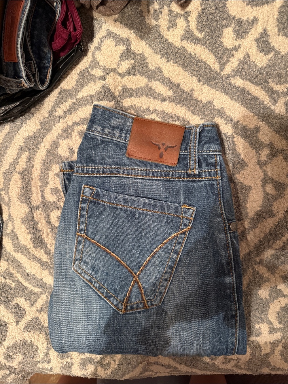 Wrangler Men's Slim Straight/bootcut Jeans in Blue with Brown Patch